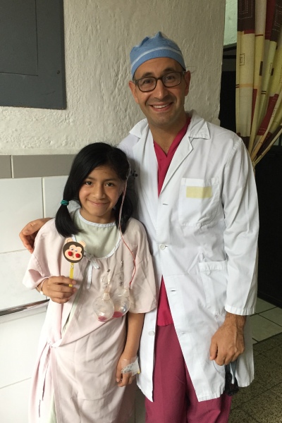 8. Dr. David Lieberman & microtia patient in Guatemala - Photo courtesy of Dr. David Lieberman