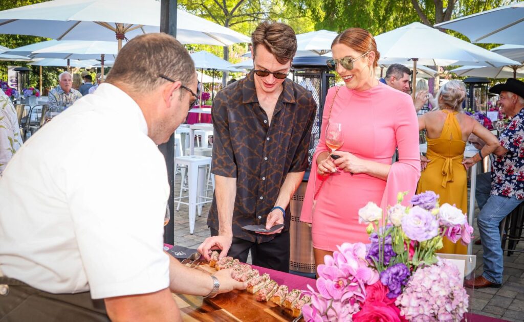 Guests enjoy delicious bites at Rock the V party.