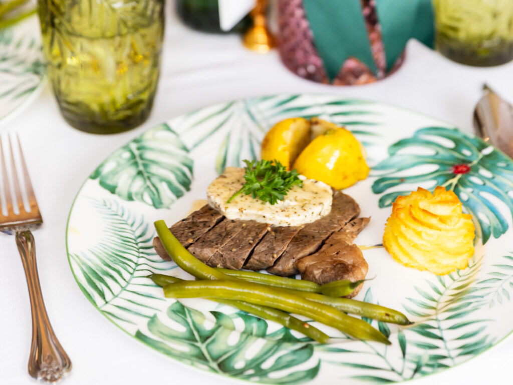 Broiled New York strip streak with millionaire butter, duchess potato
