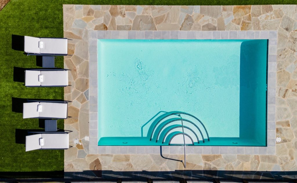 Private pool with chaise lounges at Four Seasons Napa Valley Villa & Residence Rentals.
