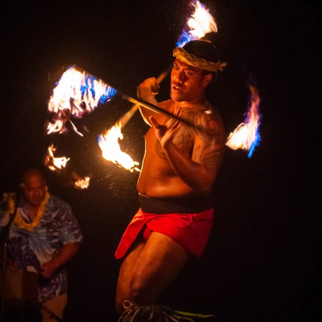 Feast at Mōkapu Lu'au fire dancer.
