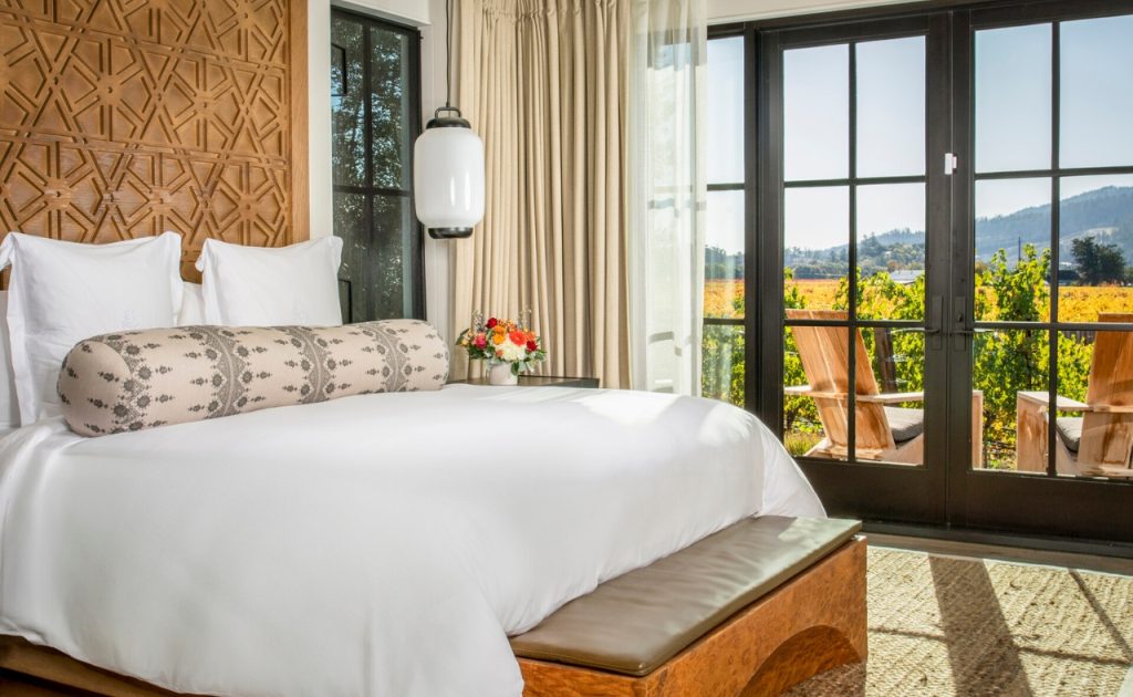 Beautiful bedroom with vineyard view at Four Seasons Napa Valley Private Residence.