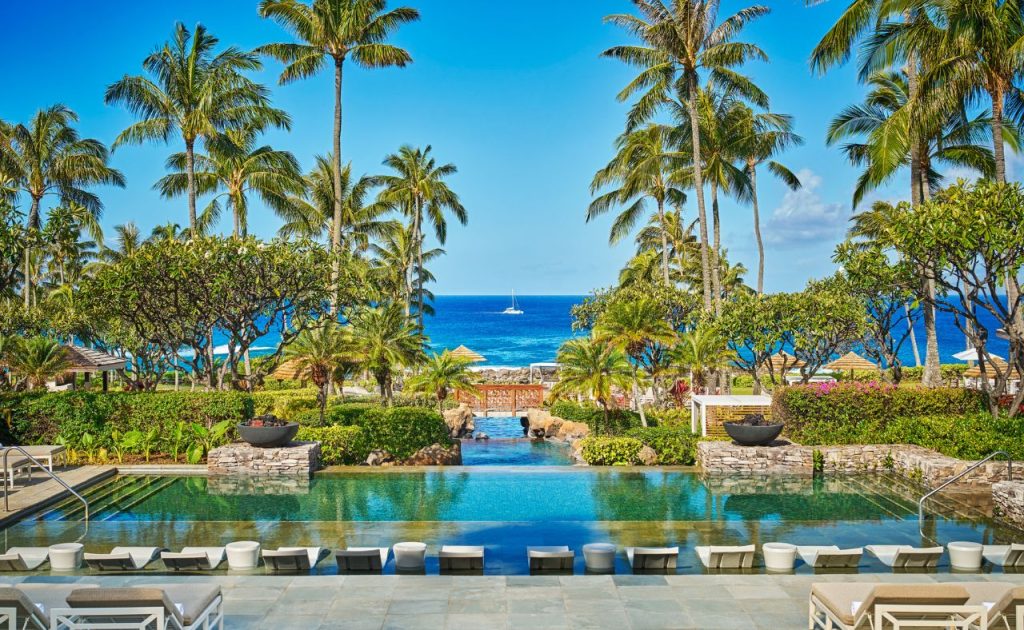 Montage Kapalua Bay pool with chaise lounges.