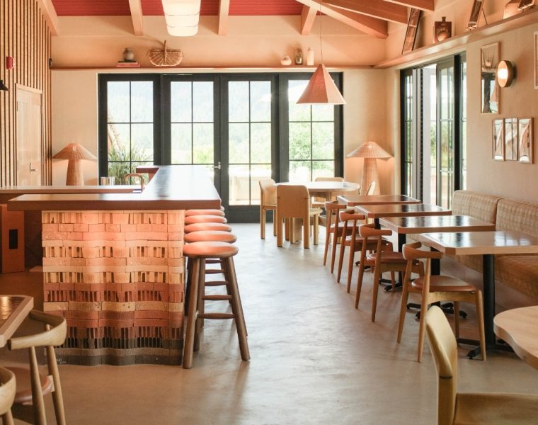 Roederer Estate tasting room with chairs, tables and bar.