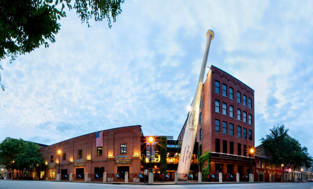 Slugger Museum and Factory, baseball bat displays, family-friendly fun, exterior view, downtown location, panoramic shot