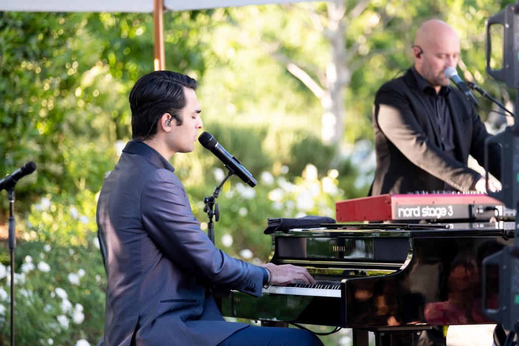 Matteo Bocelli performing live at Solage Resort, accompanied by David Ortega