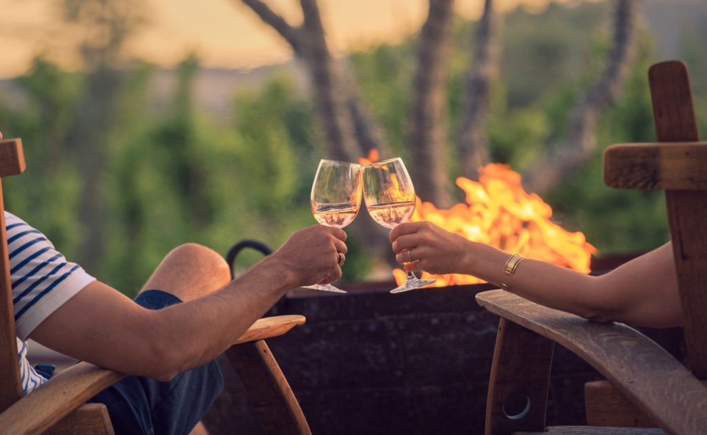 Guests drinking wine at Allegretto Vineyard Resort