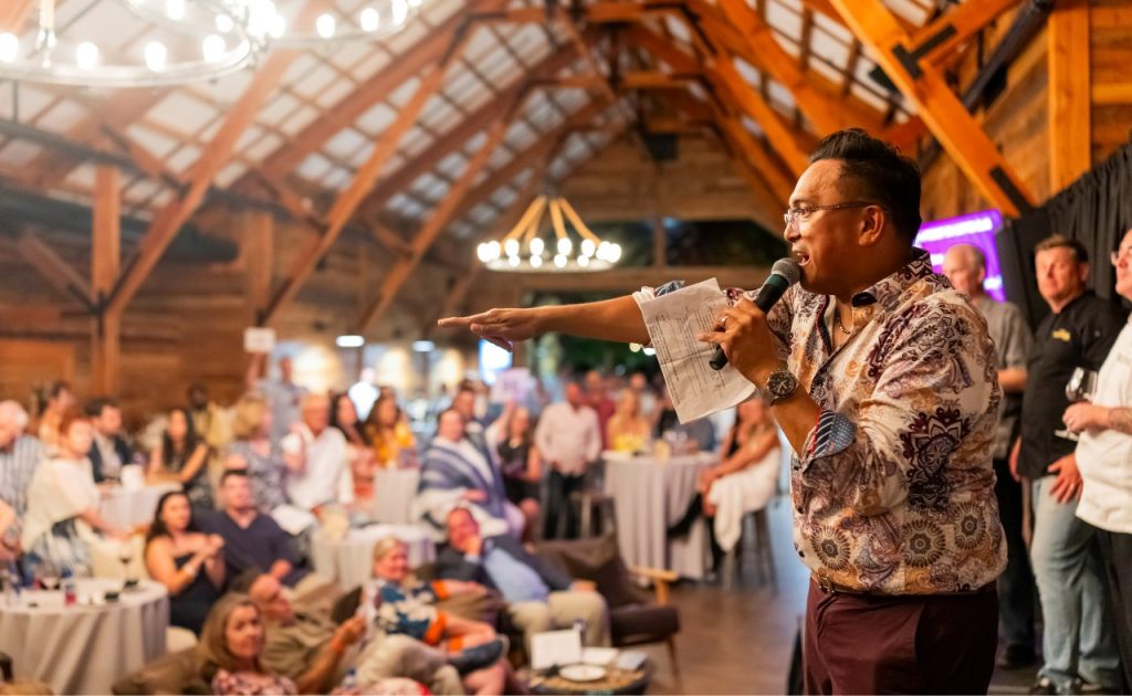 NBA “Hypeman” and Auctioneer Franco Finn of the Golden State Warriors.